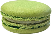 Macaron artesanal de lima y menta fresca con notas cítricas y refrescantes.